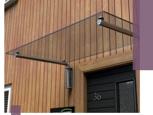 Стеклянные козырьки на входы и фасады в Тихвине